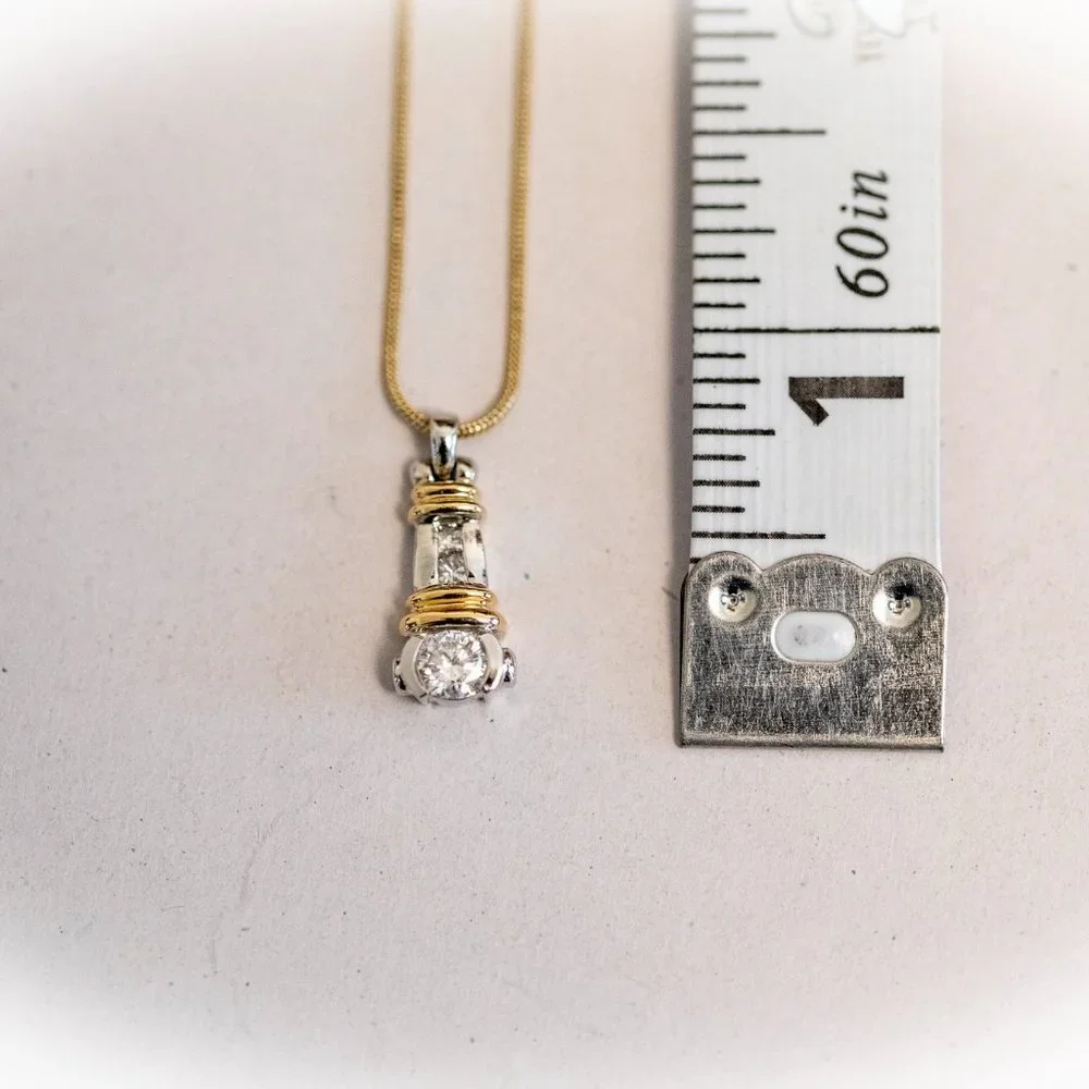 LADIES VINTAGE 14 KARAT WHITE & YELLOW GOLD BEZEL SET DIAMOND PENDANT
